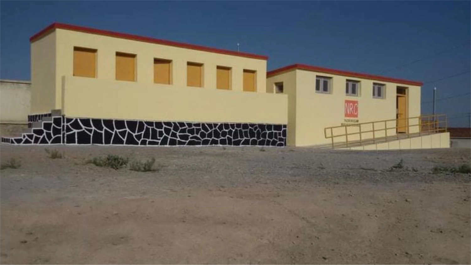 Two toilets building and septic tank including all water supply system